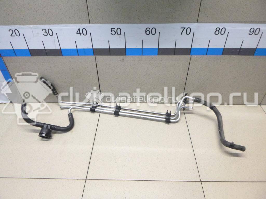 Фото Трубка топливная для двигателя BXE для Volkswagen Passat / Touran / Jetta / Golf 105 л.с 8V 1.9 л Дизельное топливо 03G130308K {forloop.counter}}