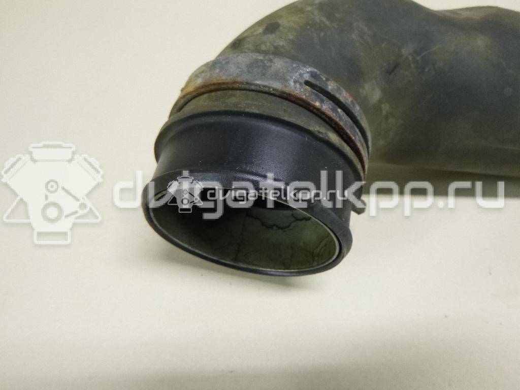 Фото Патрубок воздушного фильтра для двигателя AXB для Volkswagen Transporter / Multivan 105 л.с 8V 1.9 л Дизельное топливо 7H0129615D {forloop.counter}}