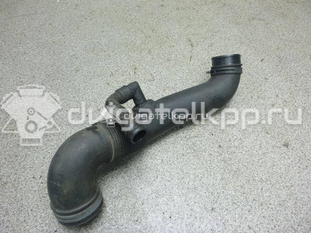 Фото Патрубок воздушного фильтра для двигателя AXC для Volkswagen Transporter / Multivan 85 л.с 8V 1.9 л Дизельное топливо 7H0129615D {forloop.counter}}