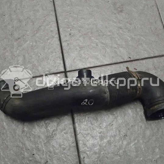 Фото Патрубок воздушного фильтра для двигателя AXC для Volkswagen Transporter / Multivan 85 л.с 8V 1.9 л Дизельное топливо 7H0129615E