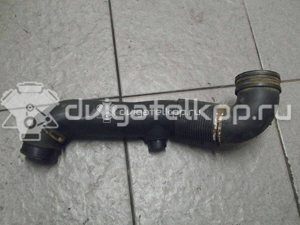 Фото Патрубок воздушного фильтра для двигателя AXC для Volkswagen Transporter / Multivan 85 л.с 8V 1.9 л Дизельное топливо 7H0129615E {forloop.counter}}