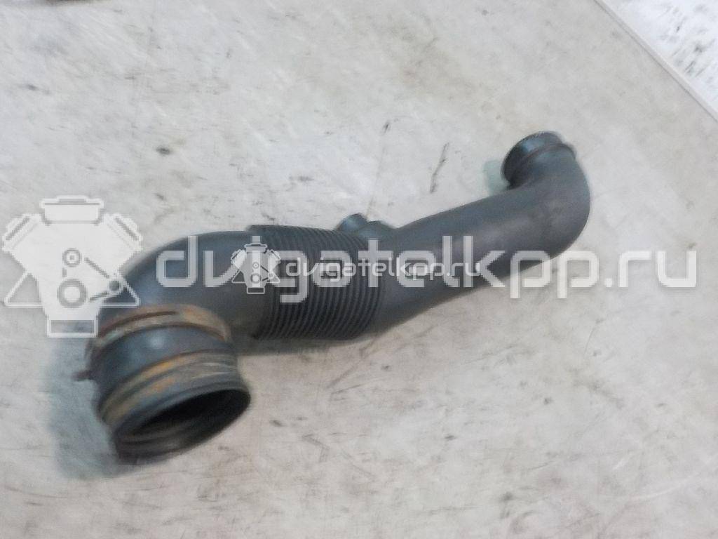 Фото Патрубок воздушного фильтра для двигателя AXC для Volkswagen Transporter / Multivan 85 л.с 8V 1.9 л Дизельное топливо 7H0129615E {forloop.counter}}