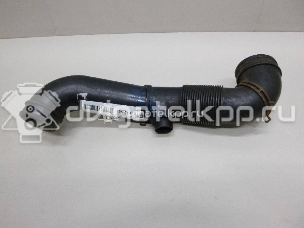 Фото Патрубок воздушного фильтра для двигателя AXC для Volkswagen Transporter / Multivan 85 л.с 8V 1.9 л Дизельное топливо 7H0129615E {forloop.counter}}