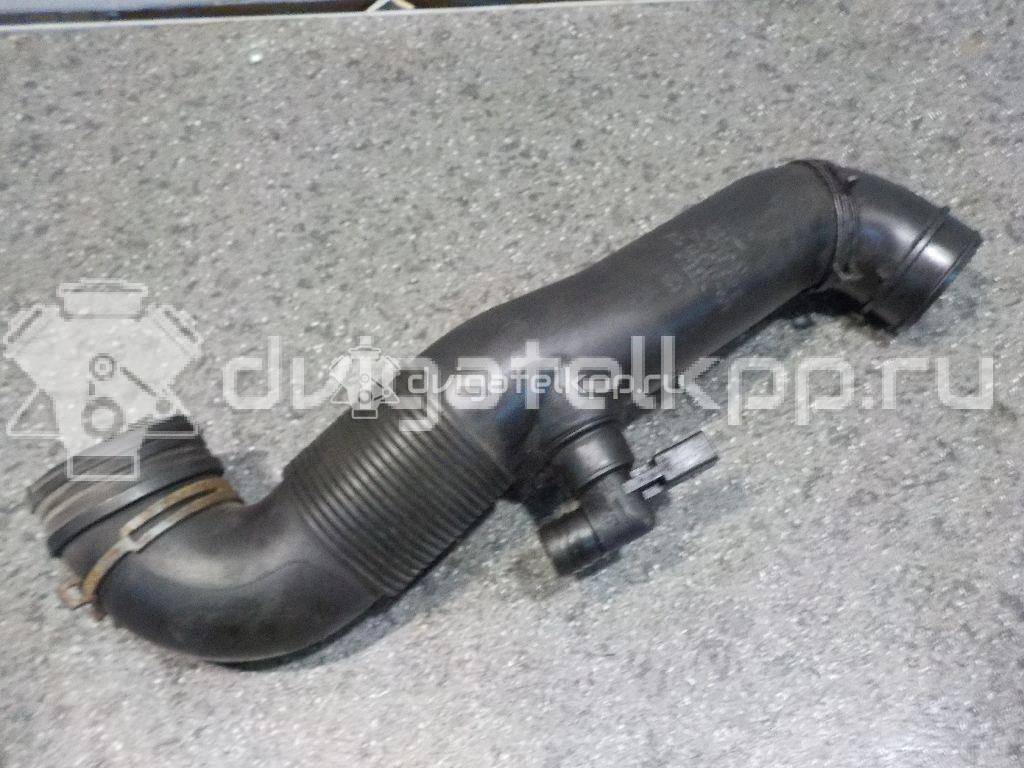 Фото Патрубок воздушного фильтра для двигателя AXC для Volkswagen Transporter / Multivan 85 л.с 8V 1.9 л Дизельное топливо 7H0129615E {forloop.counter}}