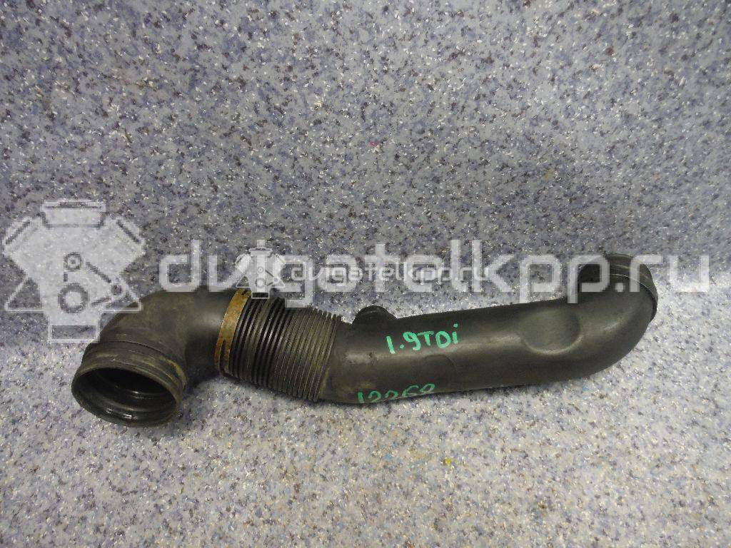 Фото Патрубок воздушного фильтра для двигателя AXC для Volkswagen Transporter / Multivan 85 л.с 8V 1.9 л Дизельное топливо 7H0129615E {forloop.counter}}