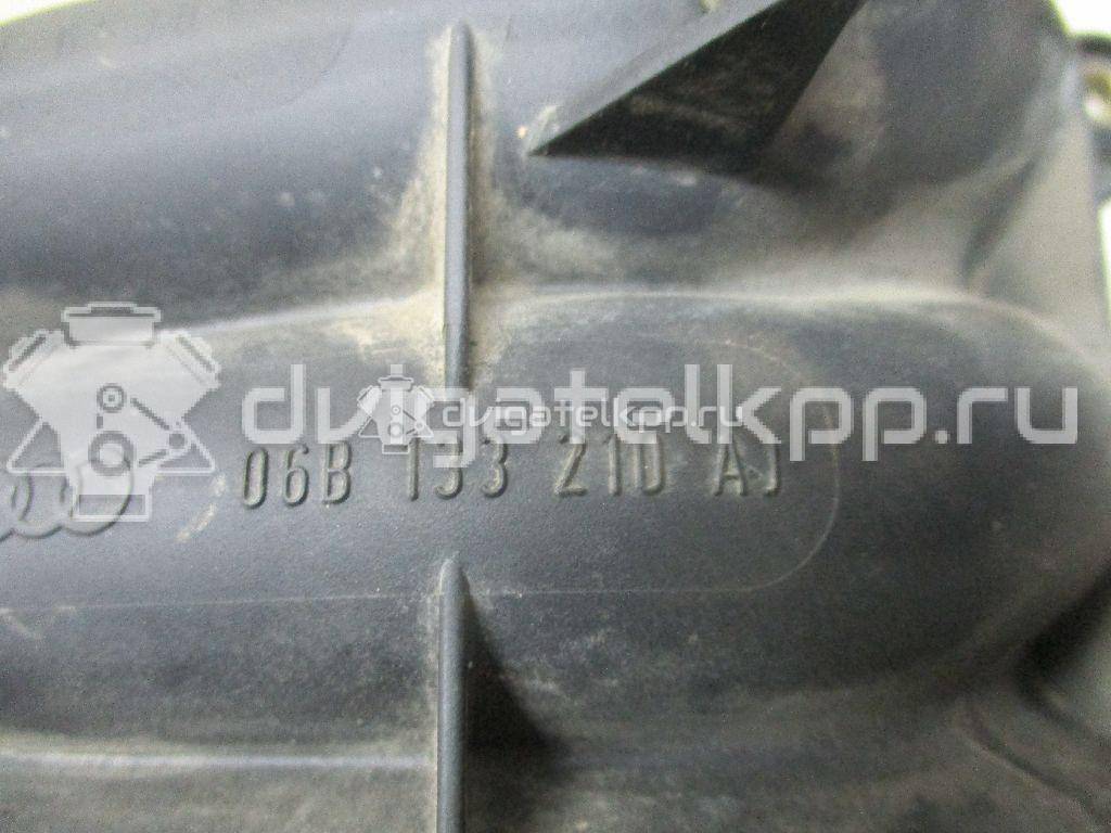 Фото Коллектор впускной для двигателя ALT для Volkswagen Passat 130 л.с 20V 2.0 л бензин 06B133213T {forloop.counter}}