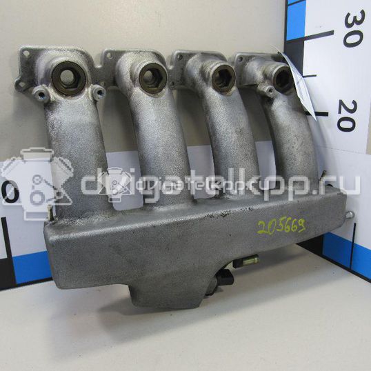 Фото Коллектор впускной для двигателя AWM для Volkswagen Passat 170 л.с 20V 1.8 л бензин 06B133201AM