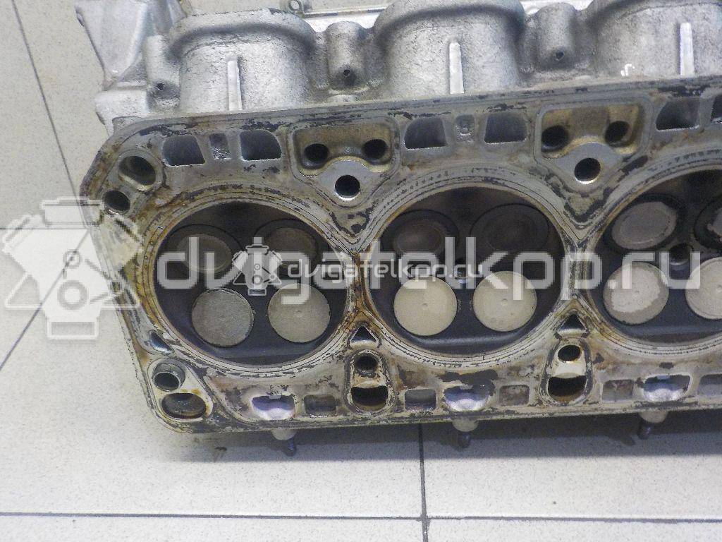 Фото Головка блока для двигателя M 48.52 для Porsche Cayenne 500-550 л.с 32V 4.8 л бензин {forloop.counter}}