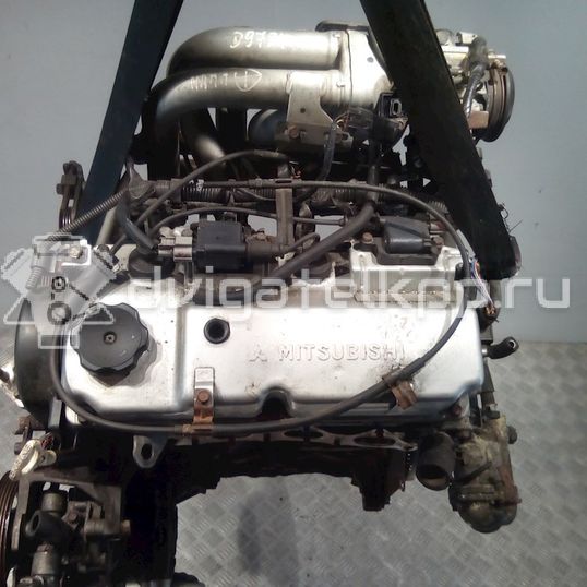 Фото Контрактный (б/у) двигатель 4G18 для Mitsubishi Lancer / Space 98-105 л.с 16V 1.6 л Бензин/газ
