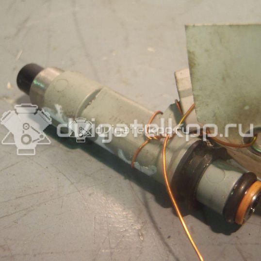 Фото Форсунка инжекторная электрическая для двигателя M15A для Suzuki Liana / Ignis / Sx4 / Swift 99-113 л.с 16V 1.5 л бензин 1571079J00