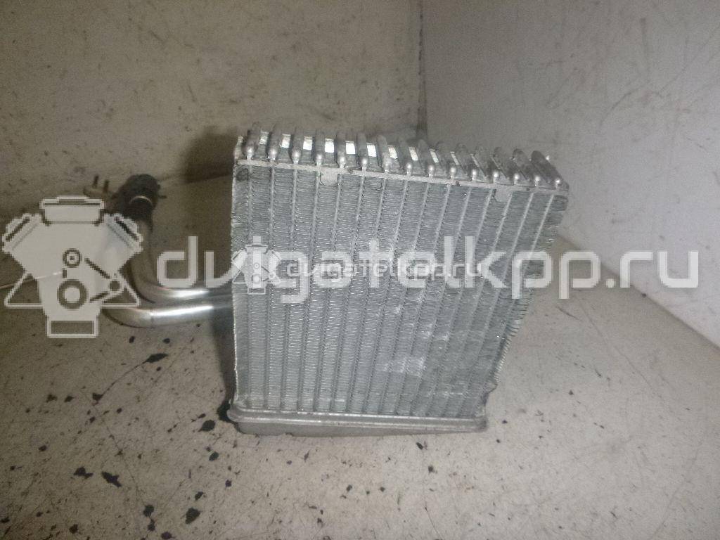 Фото Радиатор отопителя  27140AX70A для Nissan Note / Nv200 / Micra {forloop.counter}}
