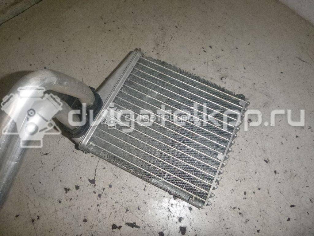 Фото Радиатор отопителя  27140AX70A для Nissan Note / Nv200 / Micra {forloop.counter}}