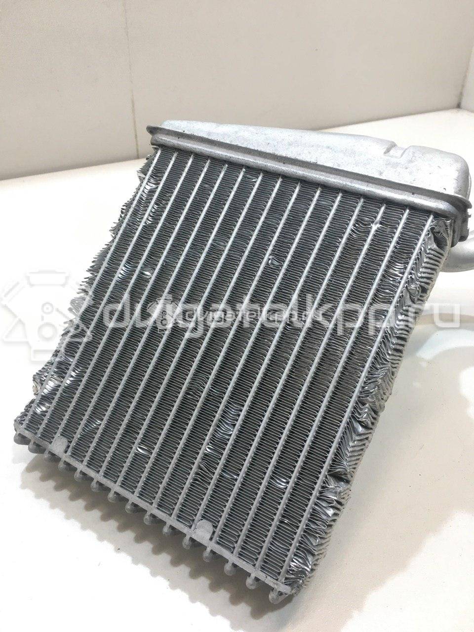 Фото Радиатор отопителя  27140AX70A для Nissan Note / Nv200 / Micra {forloop.counter}}