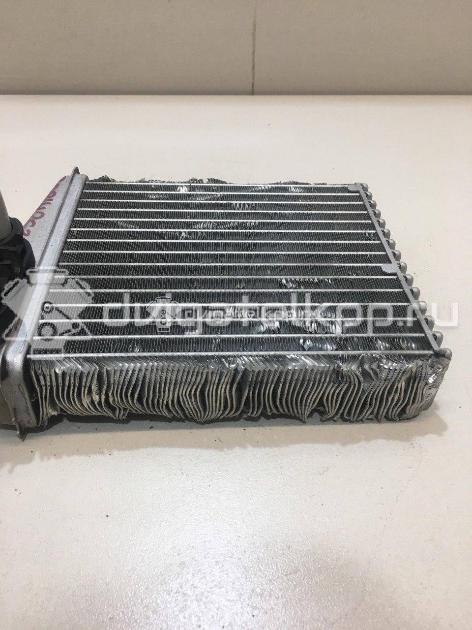Фото Радиатор отопителя  27140AX70A для Nissan Note / Nv200 / Micra {forloop.counter}}