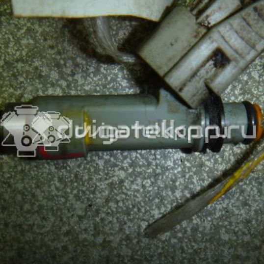 Фото Форсунка инжекторная электрическая для двигателя M16A для Suzuki Vitara / Grand Vitara / Sx4 / Liana / Swift 99-142 л.с 16V 1.6 л бензин 1571064J00