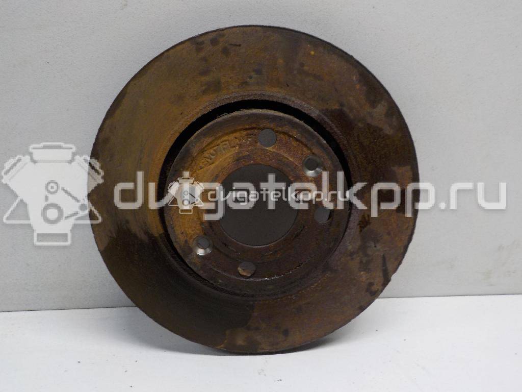 Фото Диск тормозной передний вентилируемый  402064AA1A для Nissan Note / Tiida / Micra {forloop.counter}}