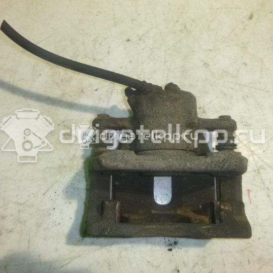 Фото Суппорт тормозной передний левый  41011AX60A для Nissan Note / Micra