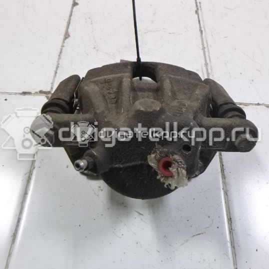 Фото Суппорт тормозной передний левый  41011AX60A для Nissan Note / Micra