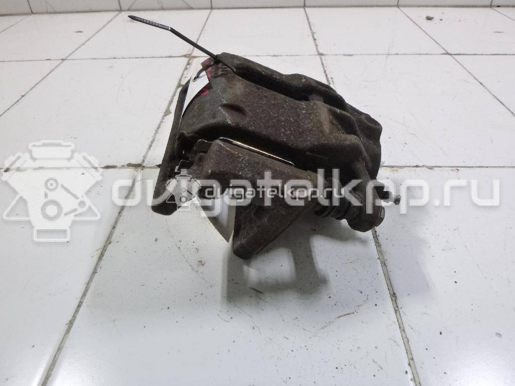 Фото Суппорт тормозной передний левый  41011AX60A для Nissan Note / Micra {forloop.counter}}