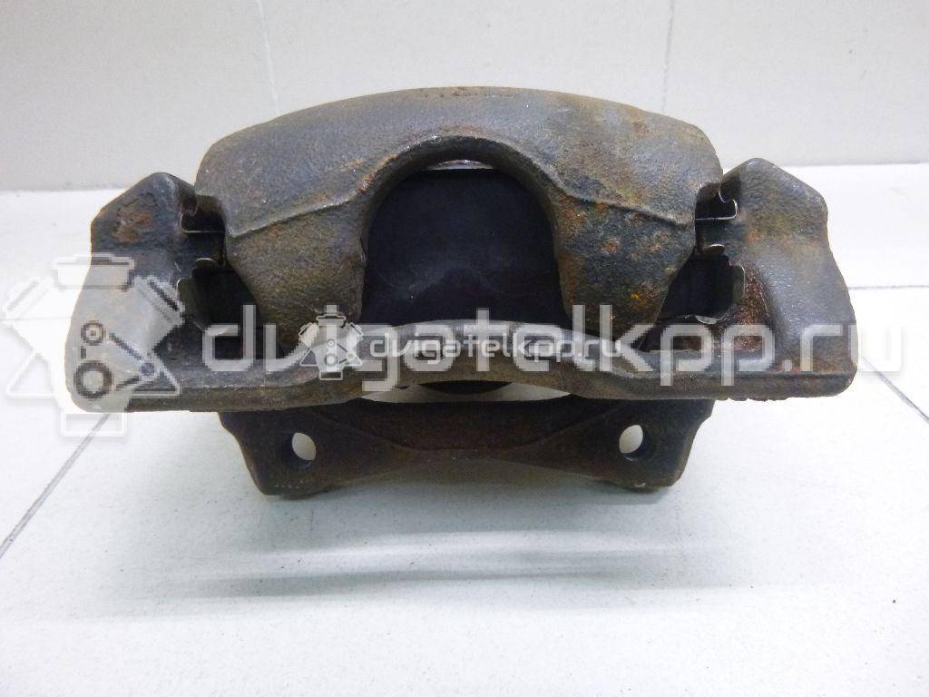 Фото Суппорт тормозной передний левый  41011AX60A для Nissan Note / Micra {forloop.counter}}