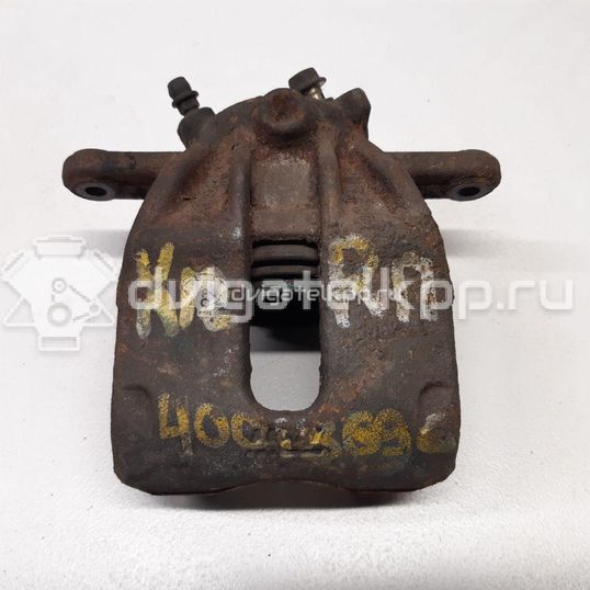 Фото Суппорт тормозной передний правый  41001AX601 для Nissan Note / Micra