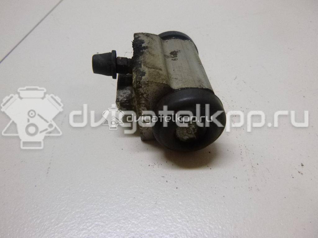 Фото Цилиндр тормозной задний  44100AX600 для Nissan Note / Tiida / Micra {forloop.counter}}