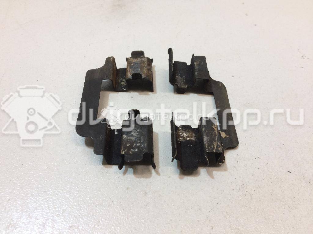 Фото К-кт установочный передних колодок  41083AX625 для Nissan Note / Tiida / Micra {forloop.counter}}