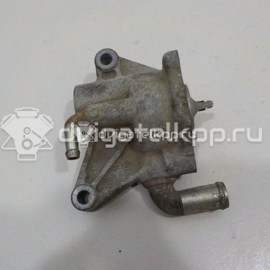 Фото Корпус термостата для двигателя M16A для Suzuki Vitara / Grand Vitara / Sx4 / Liana / Swift 99-142 л.с 16V 1.6 л бензин 1769080JA0