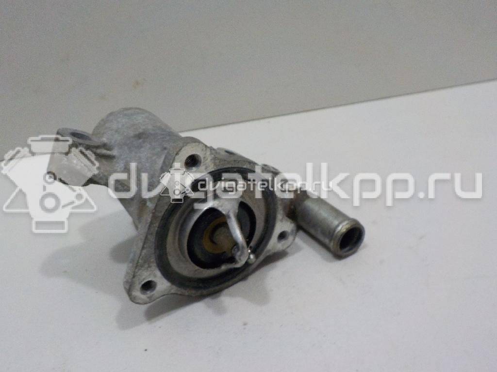 Фото Корпус термостата для двигателя M16A для Suzuki Vitara / Grand Vitara / Sx4 / Liana / Swift 99-142 л.с 16V 1.6 л бензин 1769080JA0 {forloop.counter}}