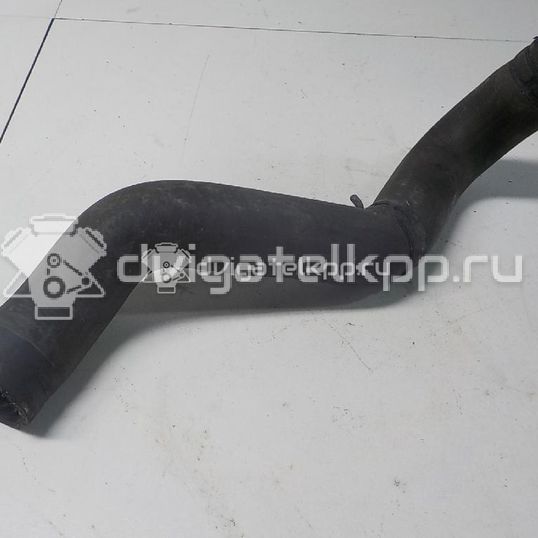 Фото Патрубок радиатора  21501EB300 для Nissan Np300