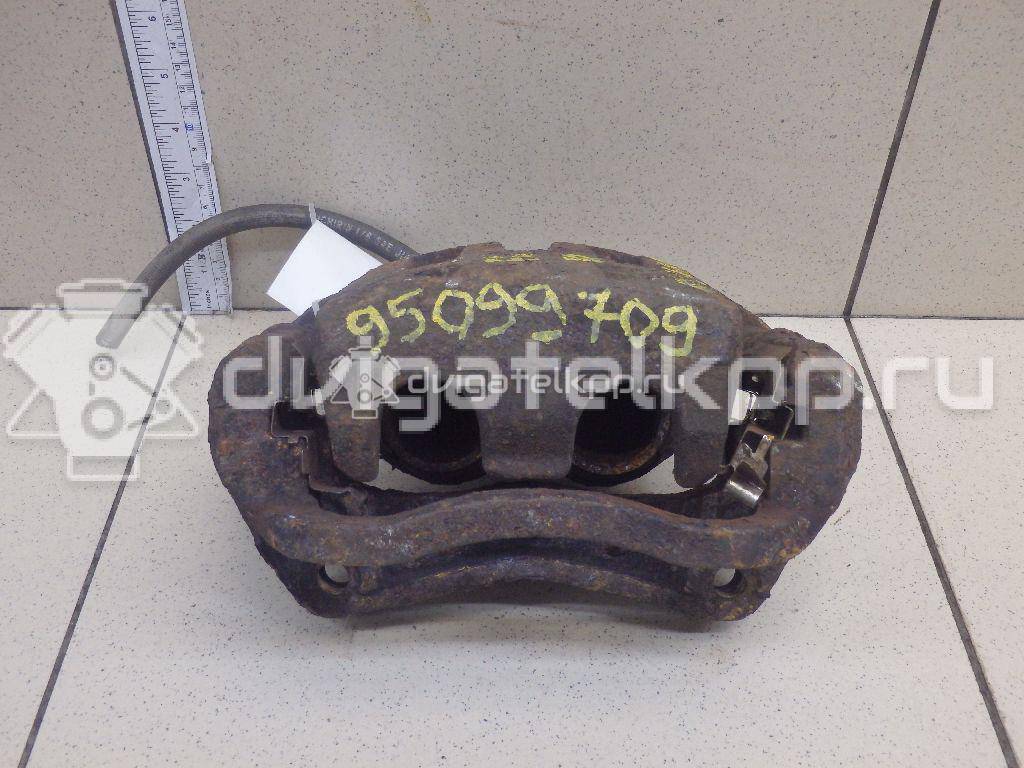 Фото Суппорт тормозной передний левый  41011EB32A для Nissan Navara / Np300 / Pathfinder {forloop.counter}}