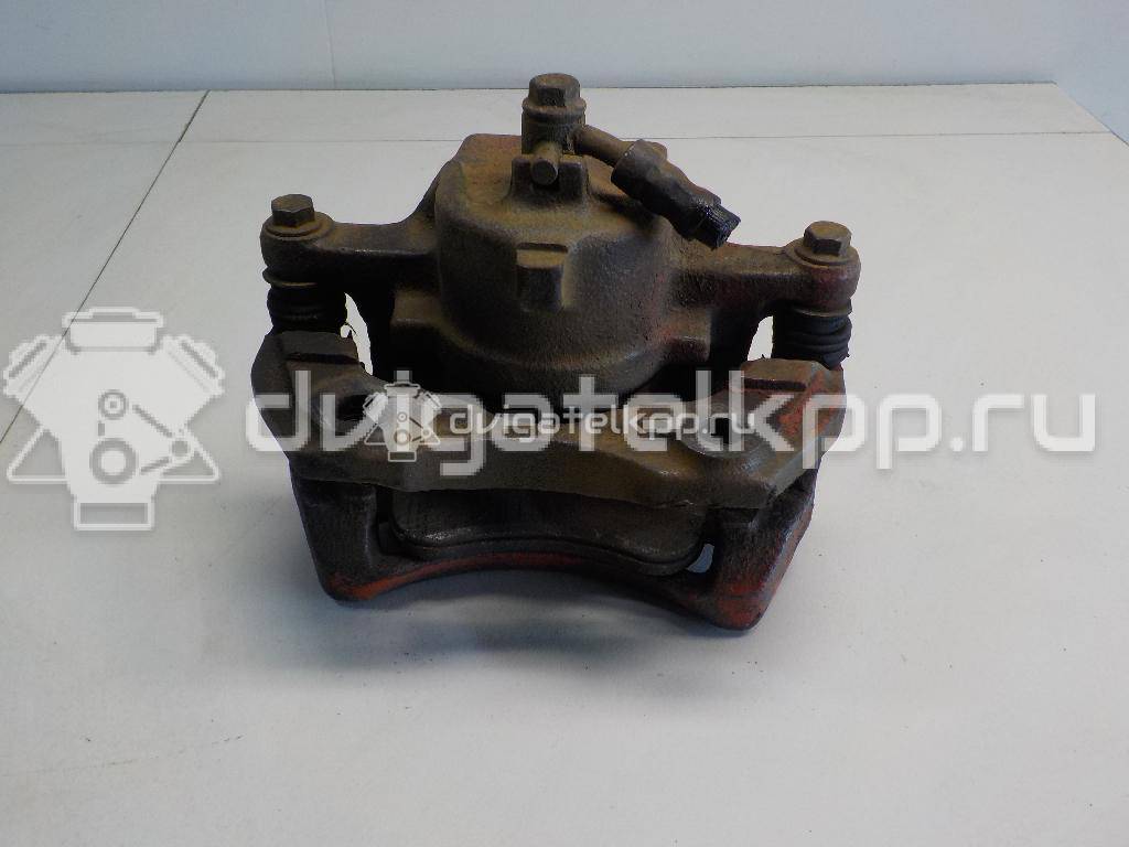 Фото Суппорт тормозной передний правый  410013F000 для Nissan Primera {forloop.counter}}