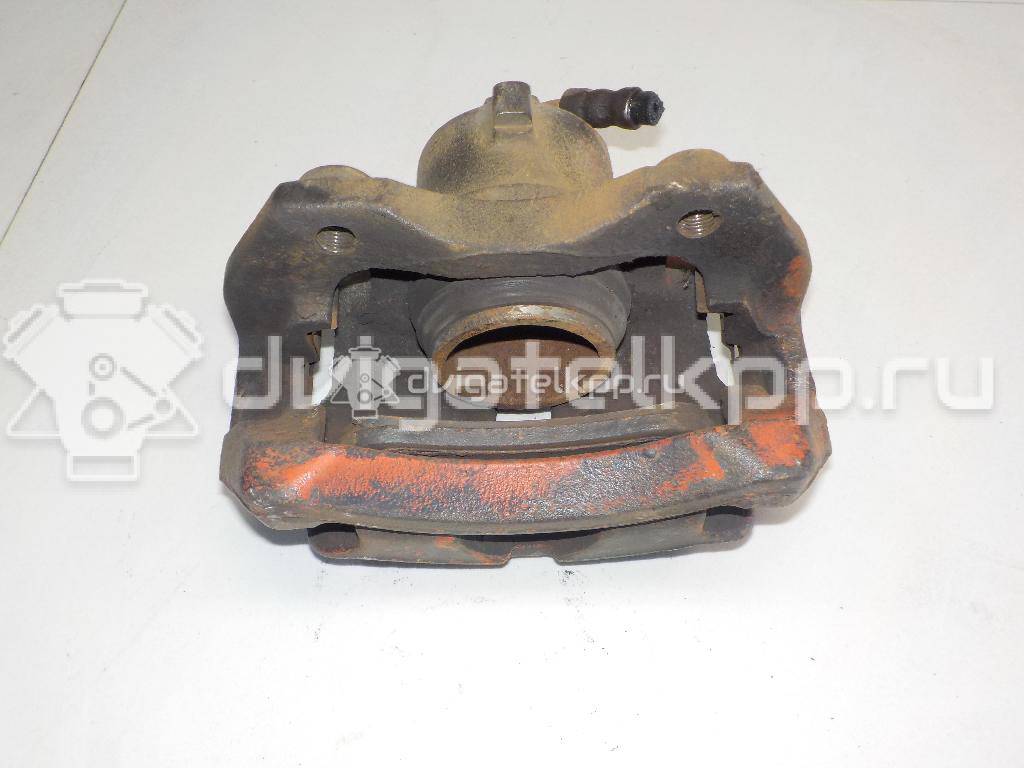 Фото Суппорт тормозной передний правый  410013F000 для Nissan Primera {forloop.counter}}