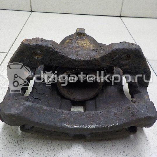 Фото Суппорт тормозной передний правый  410013F000 для Nissan Primera