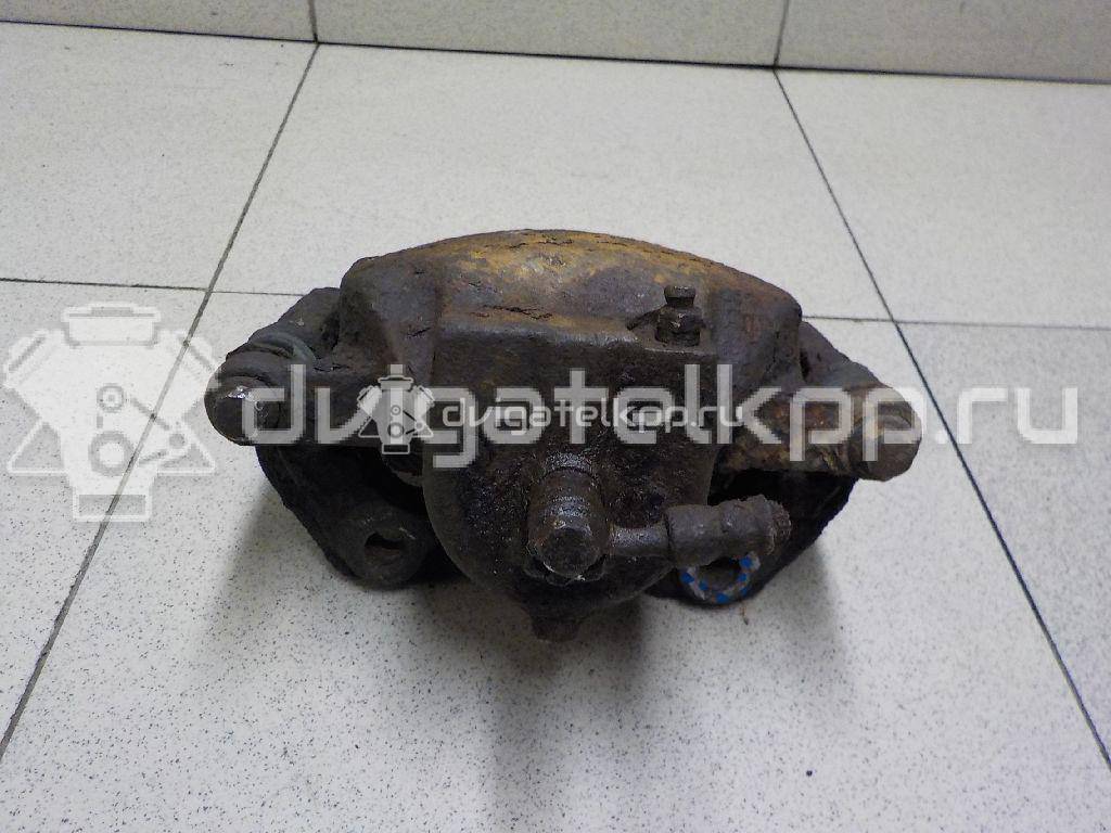 Фото Суппорт тормозной передний правый  410013F000 для Nissan Primera {forloop.counter}}