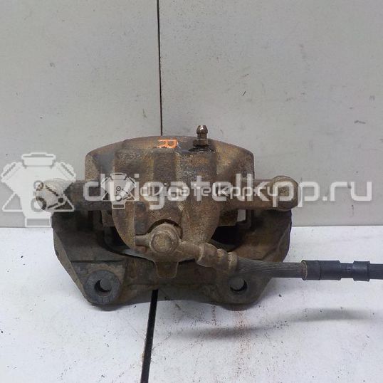 Фото Суппорт тормозной передний правый  410012F522 для Nissan Qashqai / Primera / Murano / Almera