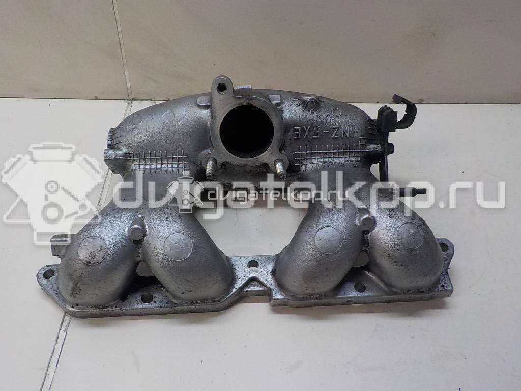 Фото Коллектор впускной для двигателя 1NZ-FXE для Toyota Yaris / Prius 58-101 л.с 16V 1.5 л бензин 1710121060 {forloop.counter}}