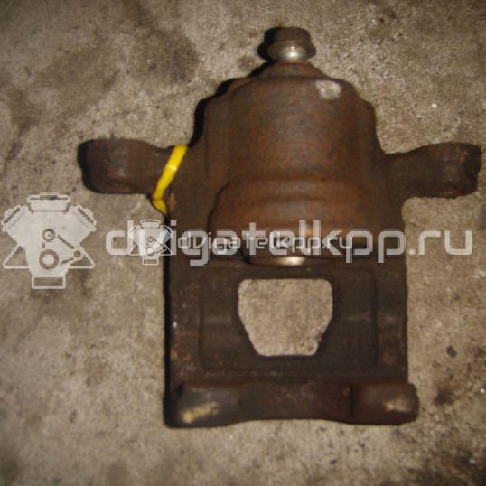 Фото Суппорт тормозной задний правый  44001EM11A для Nissan Tiida / Qashqai / Cube Z12 / Juke F15 / Pulsar C13