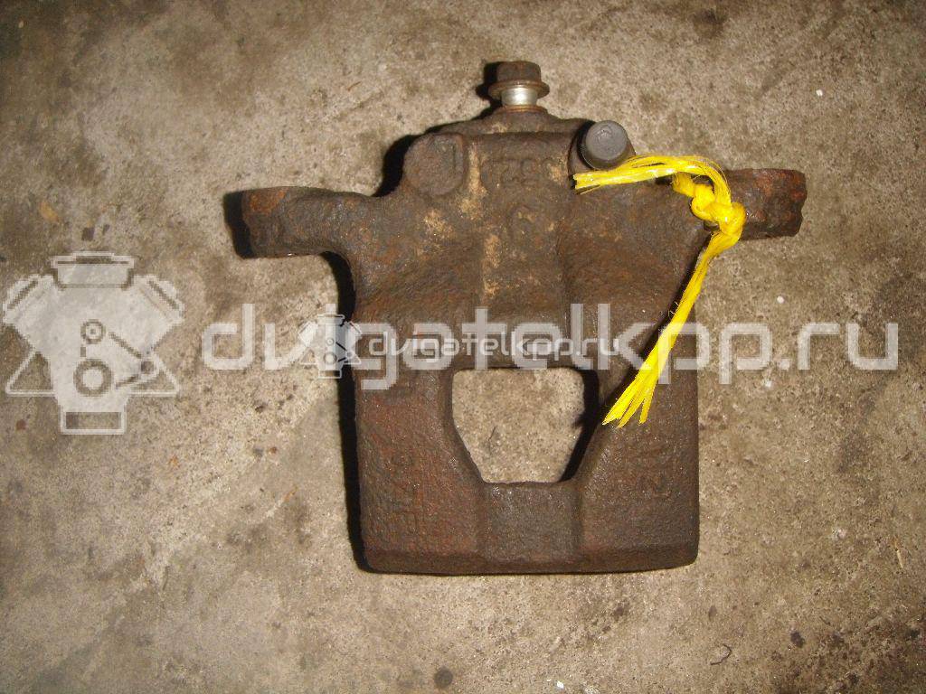 Фото Суппорт тормозной задний правый  44001EM11A для Nissan Tiida / Qashqai / Cube Z12 / Juke F15 / Pulsar C13 {forloop.counter}}