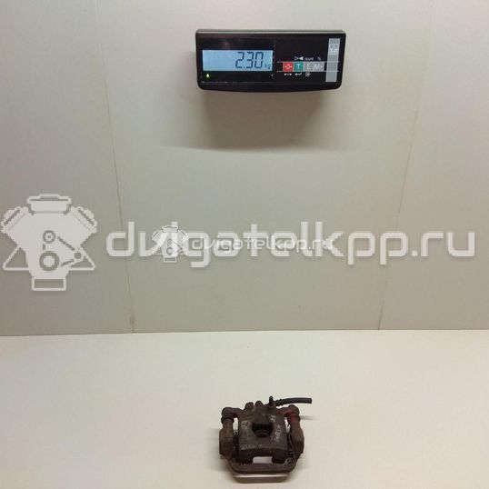 Фото Суппорт тормозной задний правый  44001EM11A для Nissan Tiida / Qashqai / Cube Z12 / Juke F15 / Pulsar C13