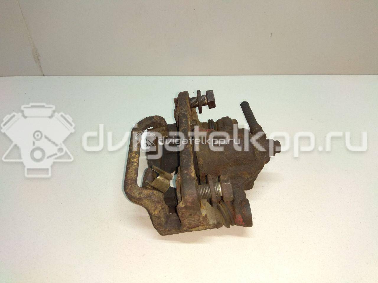 Фото Суппорт тормозной задний правый  44001EM11A для Nissan Tiida / Qashqai / Cube Z12 / Juke F15 / Pulsar C13 {forloop.counter}}