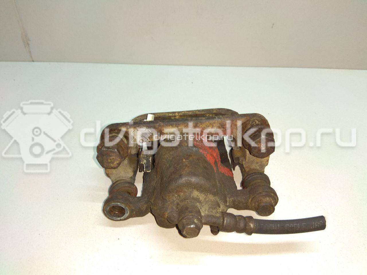 Фото Суппорт тормозной задний правый  44001EM11A для Nissan Tiida / Qashqai / Cube Z12 / Juke F15 / Pulsar C13 {forloop.counter}}