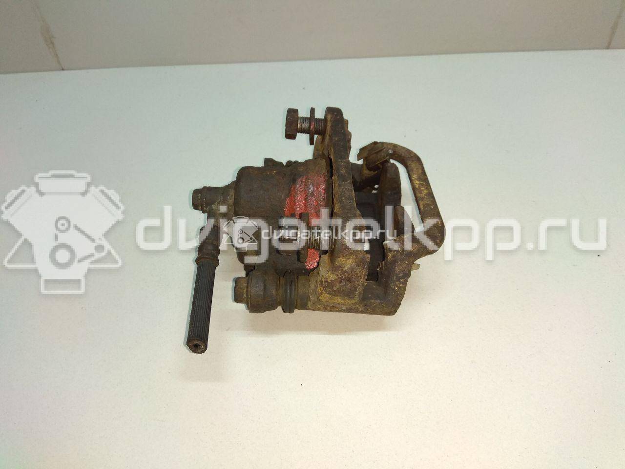 Фото Суппорт тормозной задний правый  44001EM11A для Nissan Tiida / Qashqai / Cube Z12 / Juke F15 / Pulsar C13 {forloop.counter}}