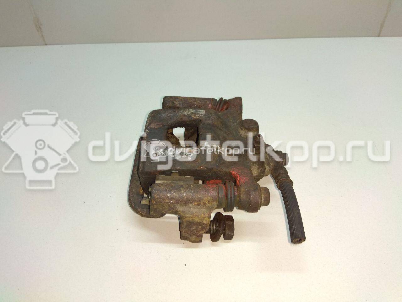Фото Суппорт тормозной задний правый  44001EM11A для Nissan Tiida / Qashqai / Cube Z12 / Juke F15 / Pulsar C13 {forloop.counter}}