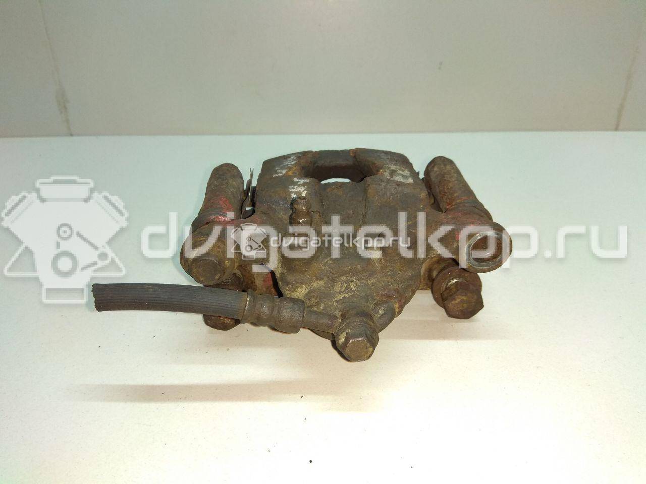 Фото Суппорт тормозной задний правый  44001EM11A для Nissan Tiida / Qashqai / Cube Z12 / Juke F15 / Pulsar C13 {forloop.counter}}
