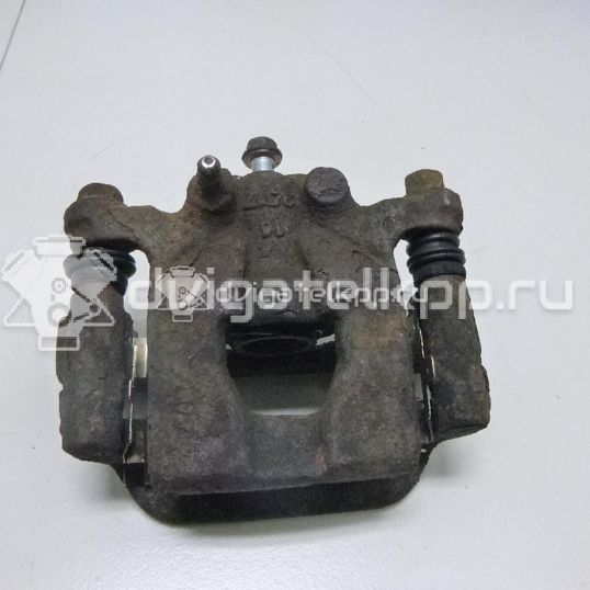 Фото Суппорт тормозной задний правый  44001EM11A для Nissan Tiida / Qashqai / Cube Z12 / Juke F15 / Pulsar C13