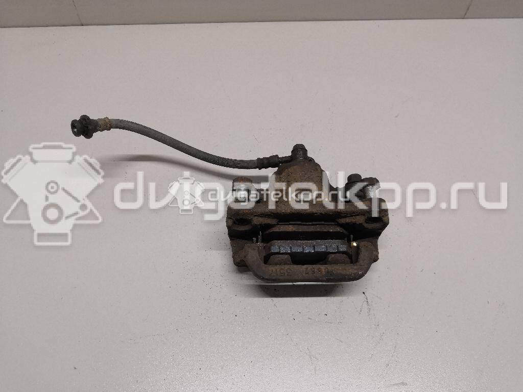 Фото Суппорт тормозной задний правый  44001EM11A для Nissan Tiida / Qashqai / Cube Z12 / Juke F15 / Pulsar C13 {forloop.counter}}