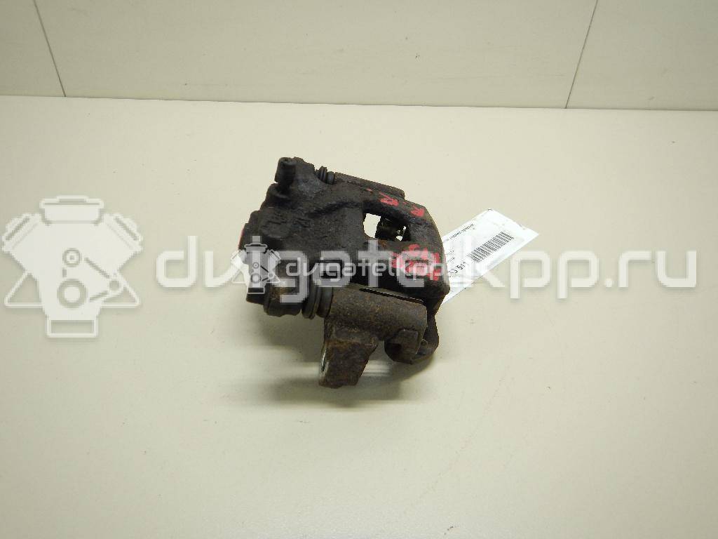 Фото Суппорт тормозной задний правый  44001EM11A для Nissan Tiida / Qashqai / Cube Z12 / Juke F15 / Pulsar C13 {forloop.counter}}