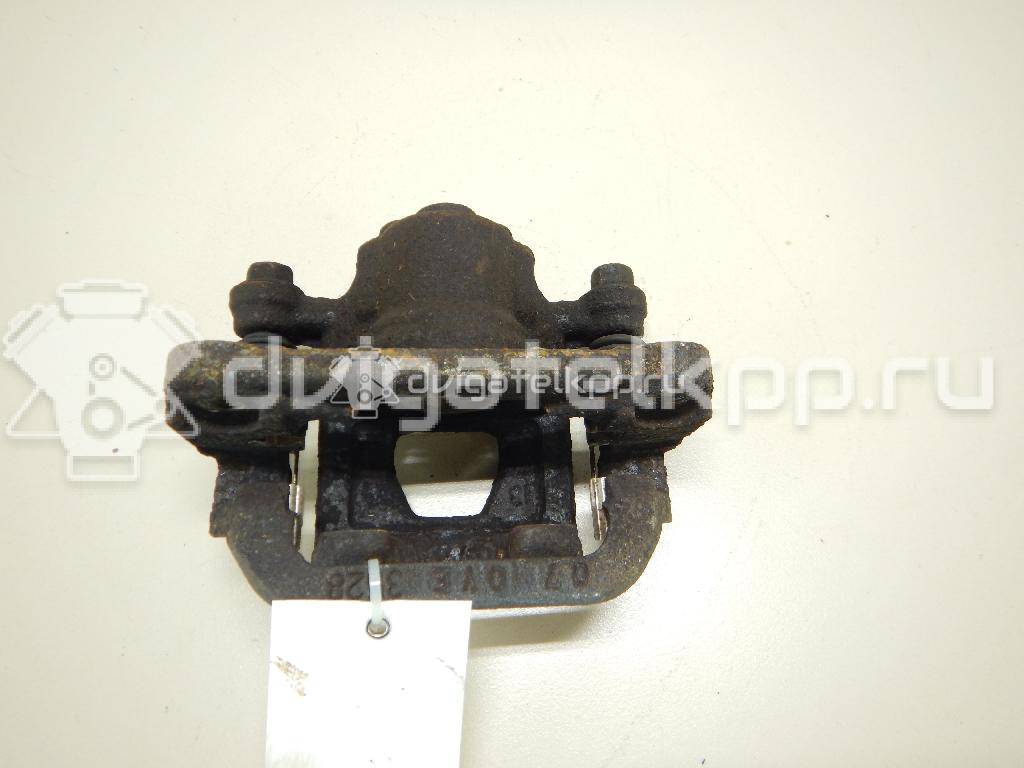 Фото Суппорт тормозной задний правый  44001EM11A для Nissan Tiida / Qashqai / Cube Z12 / Juke F15 / Pulsar C13 {forloop.counter}}