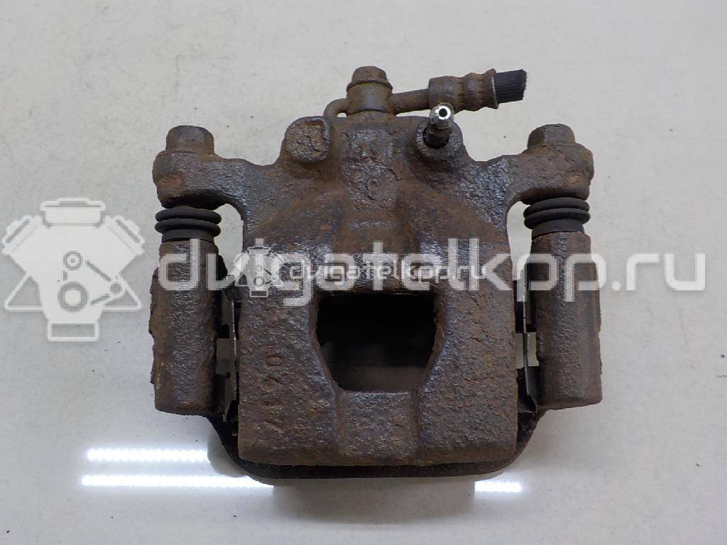 Фото Суппорт тормозной задний правый  44001EM11A для Nissan Tiida / Qashqai / Cube Z12 / Juke F15 / Pulsar C13 {forloop.counter}}